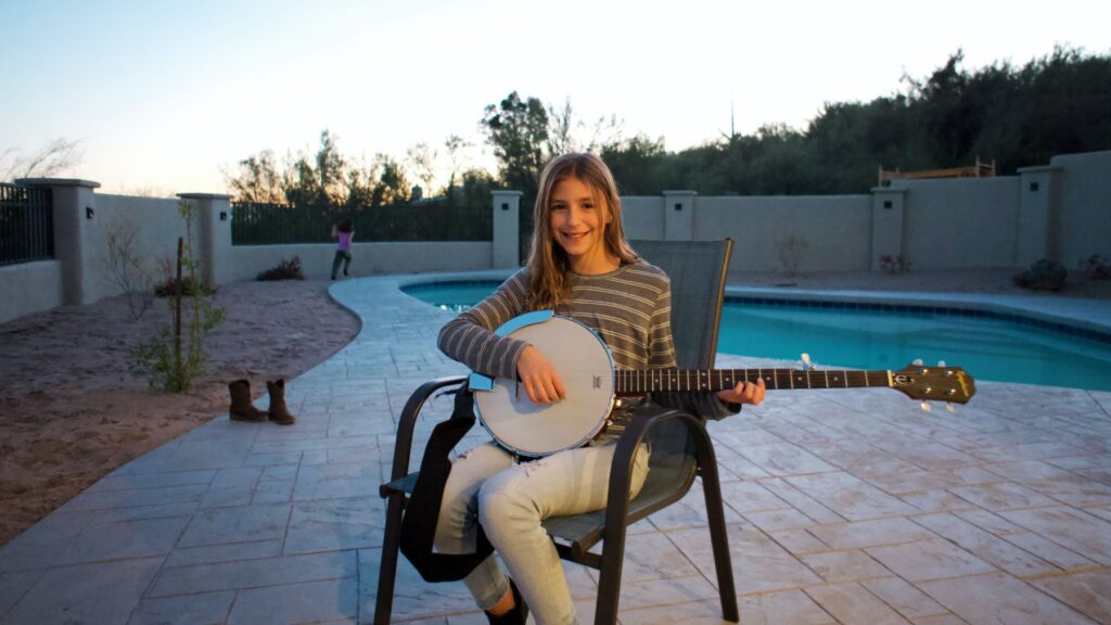 girl playing the mandolin