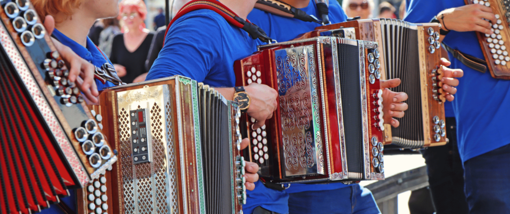 group of people playing the accordion