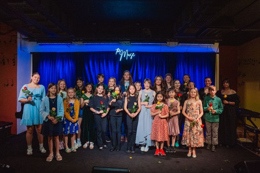 group of students with flowers