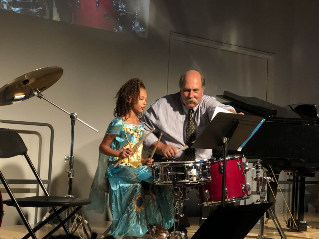 student playing Drums with teacher in Lake Forest, CA