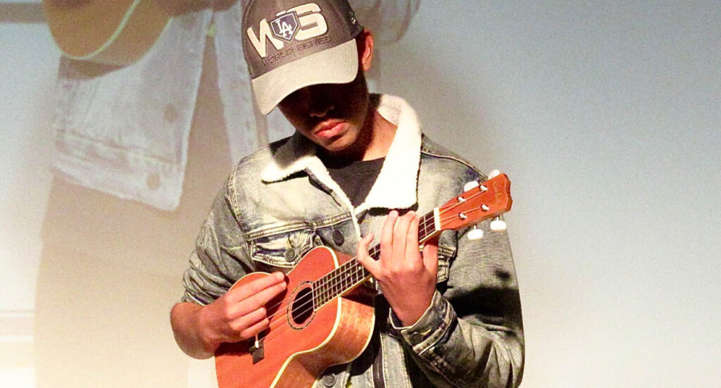 kid playing ukulele in Lake Forest, CA