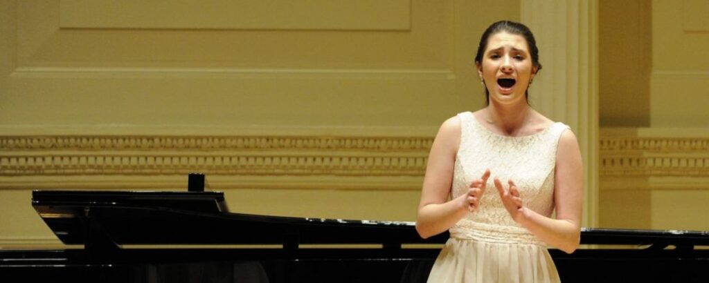 student singing int he recital
