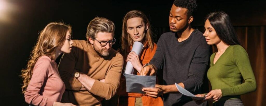 students checking the notes for the audition