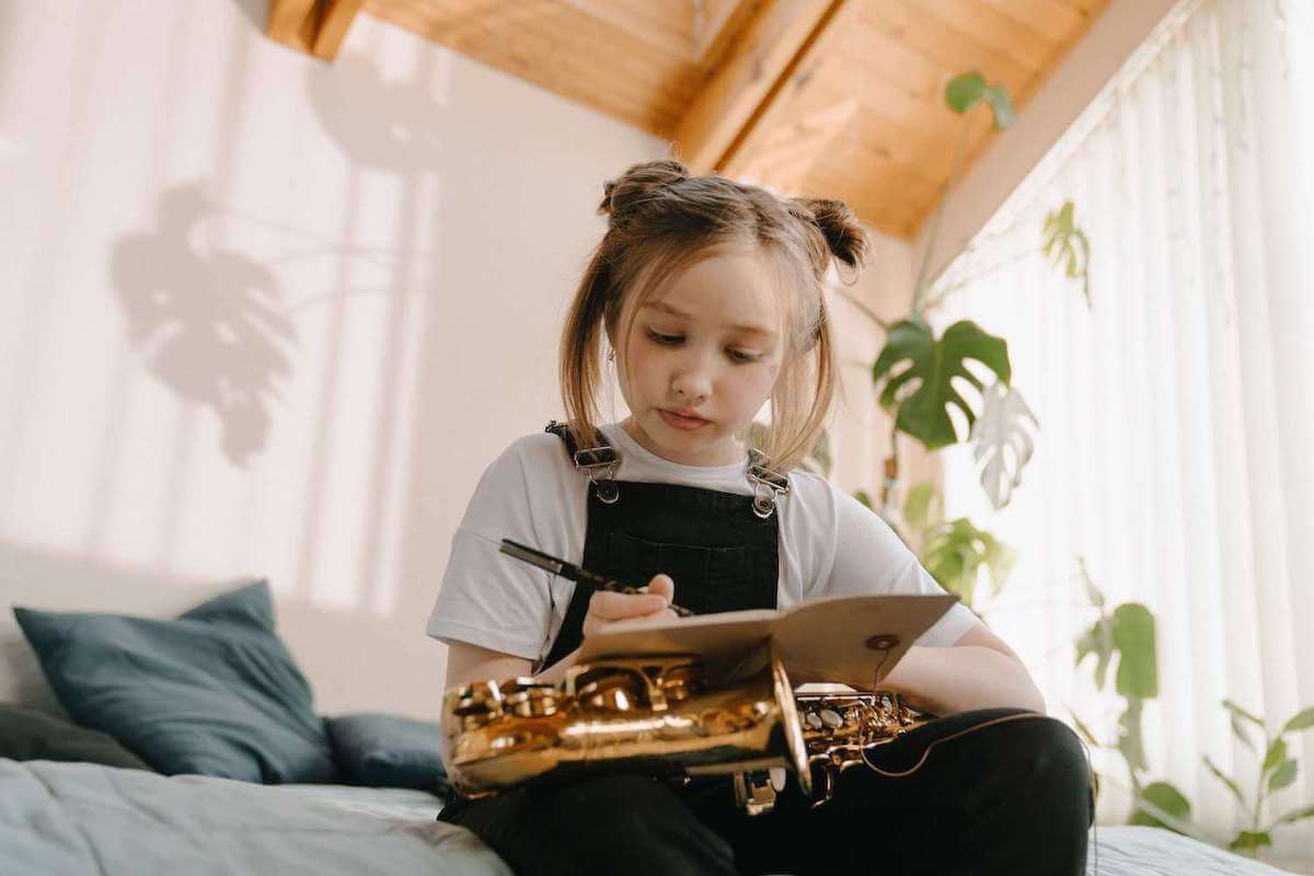 young student taking notes in LA