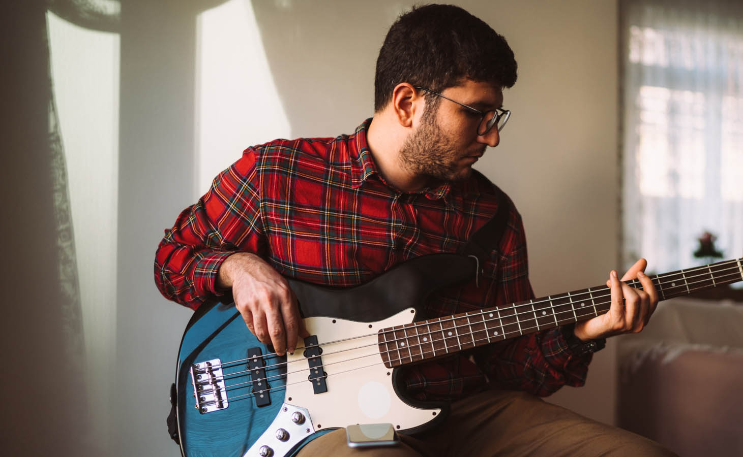Student Playing Bass Guitar