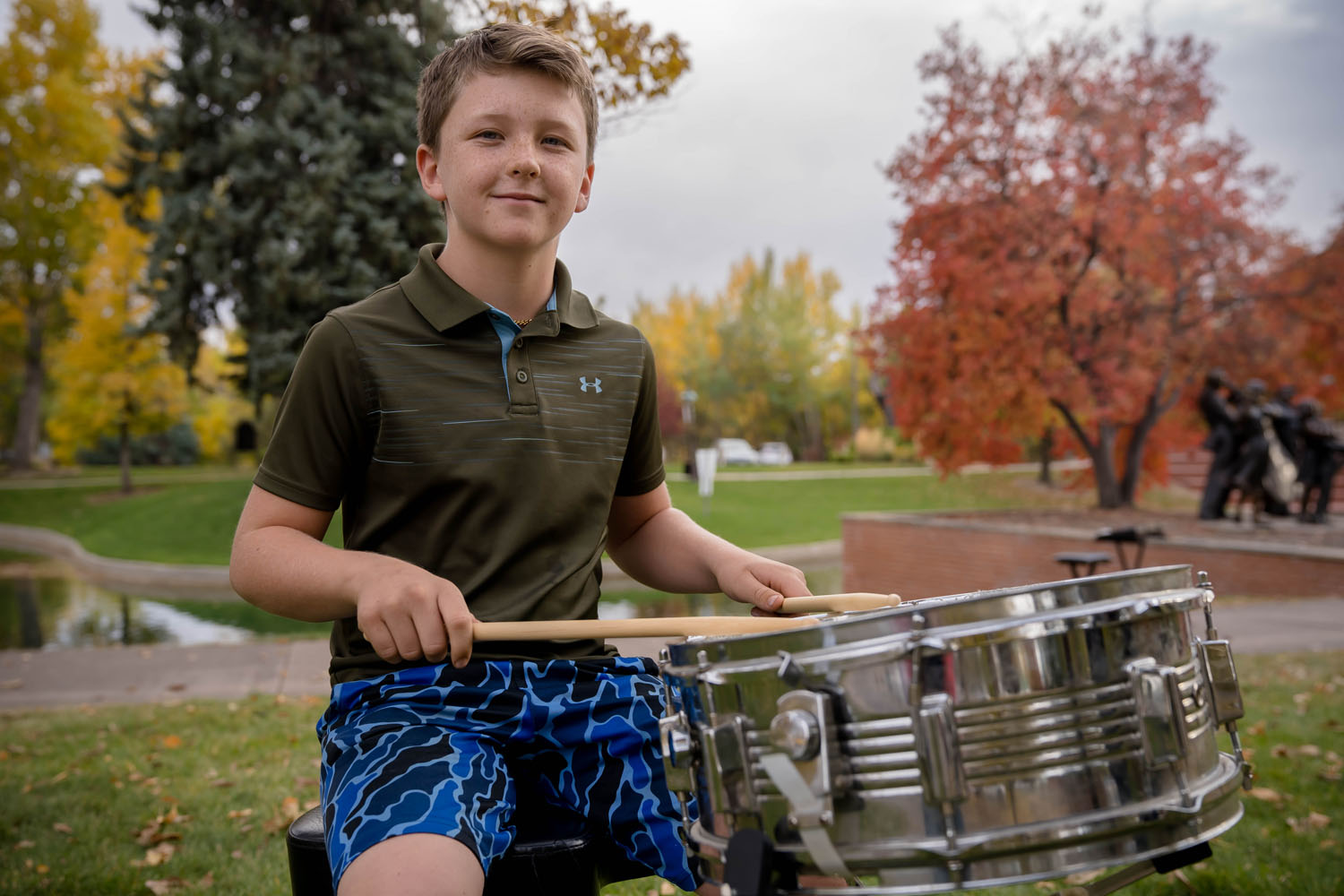 Student playing the drums in Loveland CO