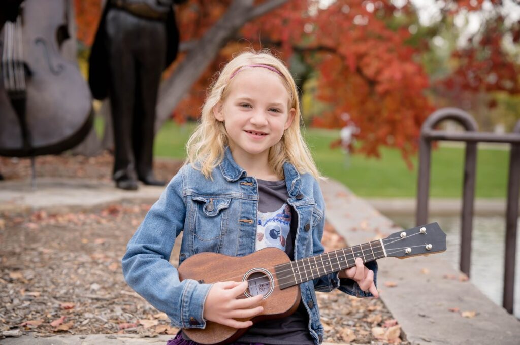 Student playing Ukulele