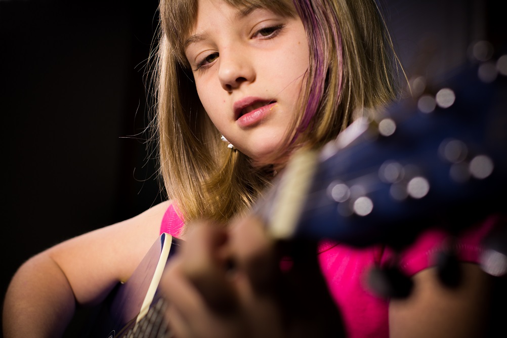 student playing Guitar in Loveland, CO