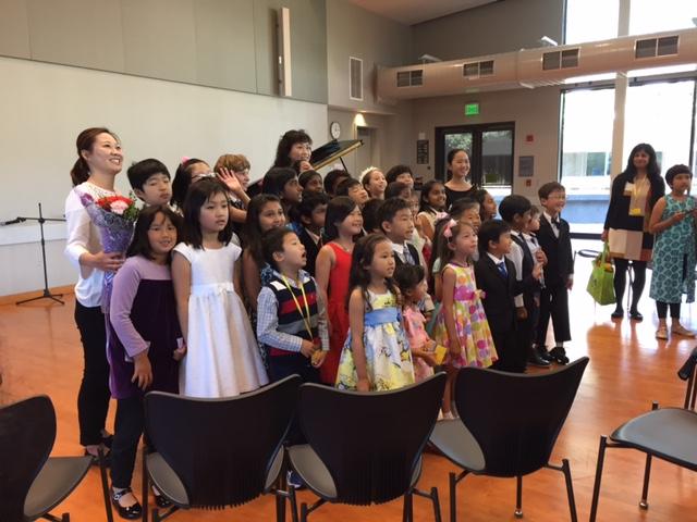 children singing together at recital