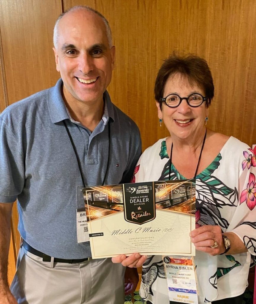 Bryan Berk and Myrna Sislen  with award