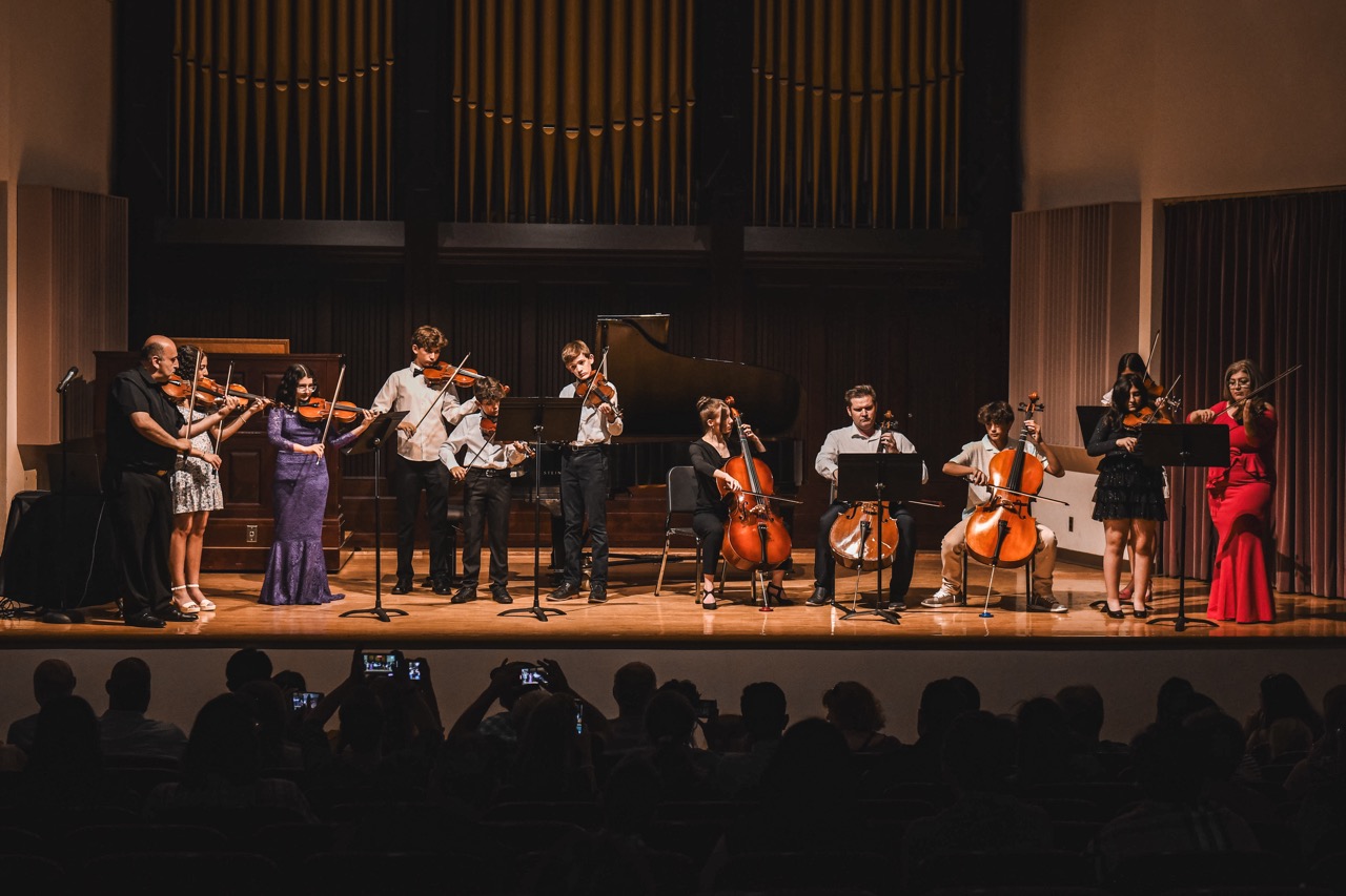 String ensemble on recital stage