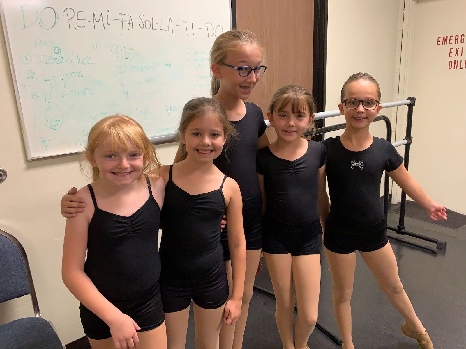 dancers hugging each other