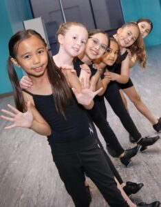 tap dancers together in class