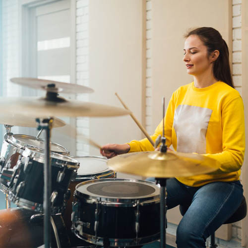 Girl playing Drums