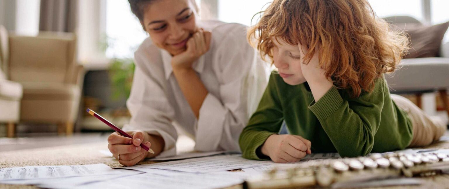 student and the teacher playing the flute