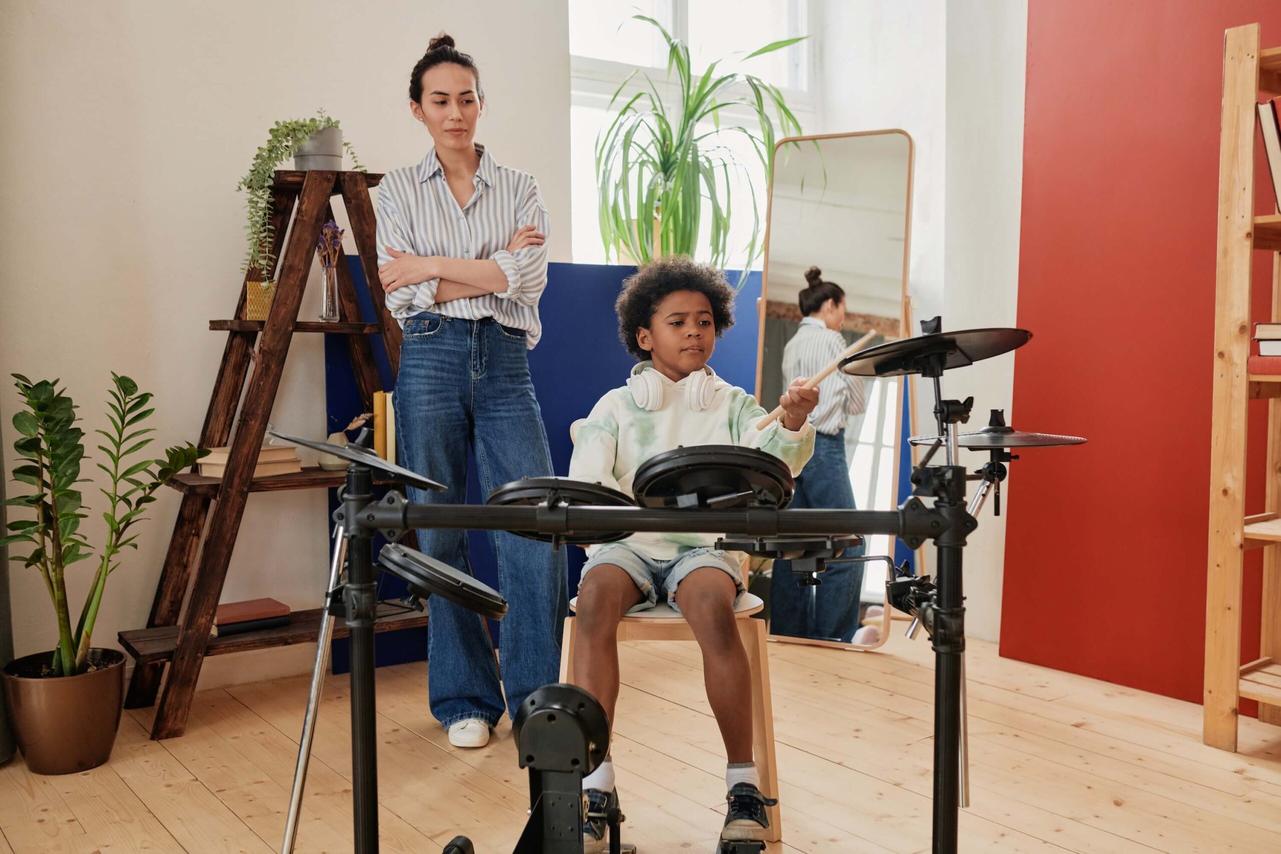 student learning to play the drums at home with a drum teacher Pleasanton CA