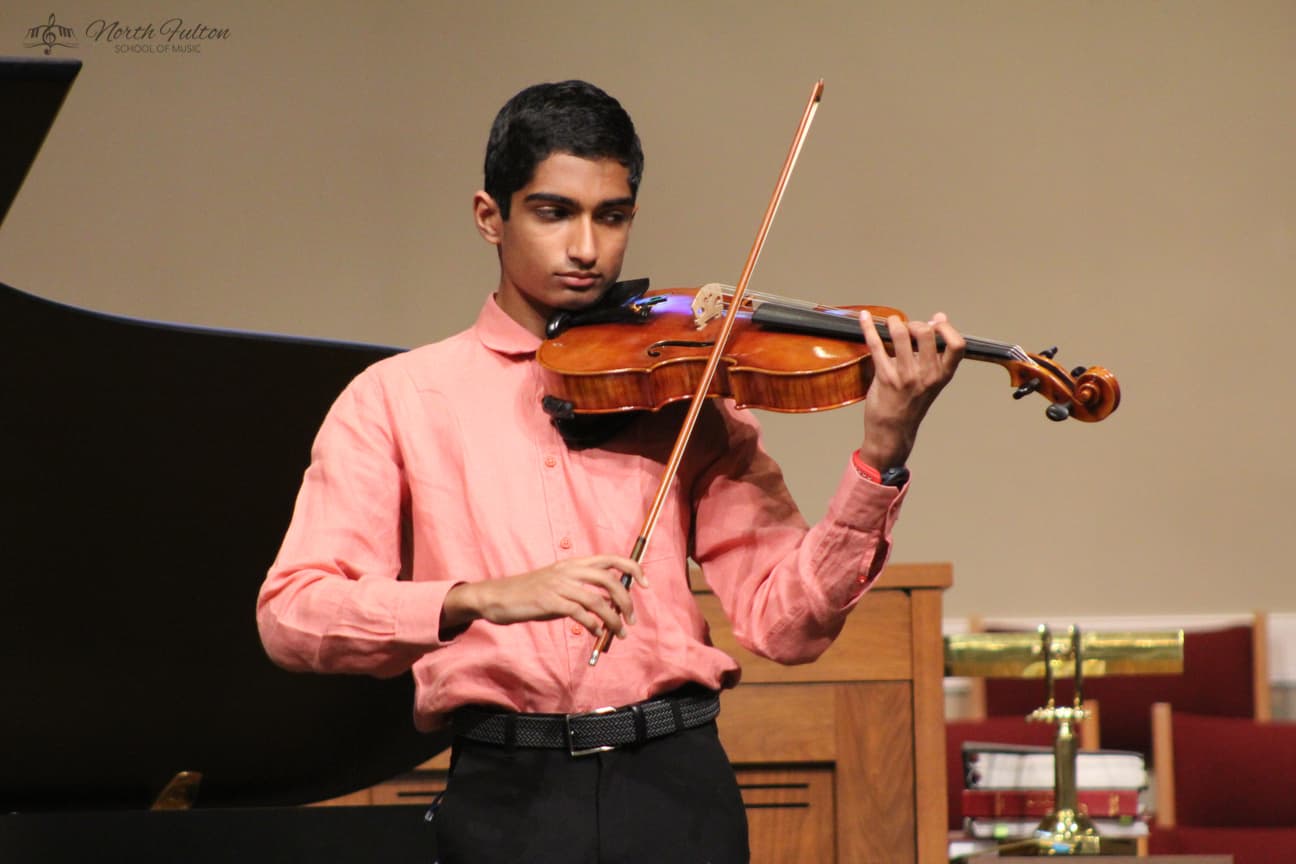 student playing the violin