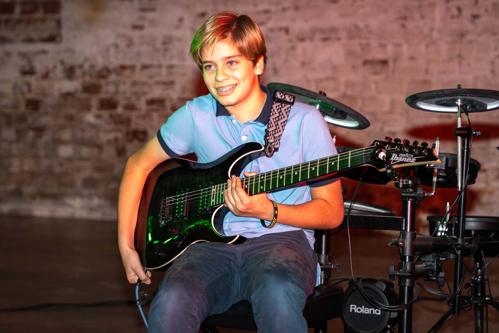 student playing guitar at Tampa music school Wesley chapel FL