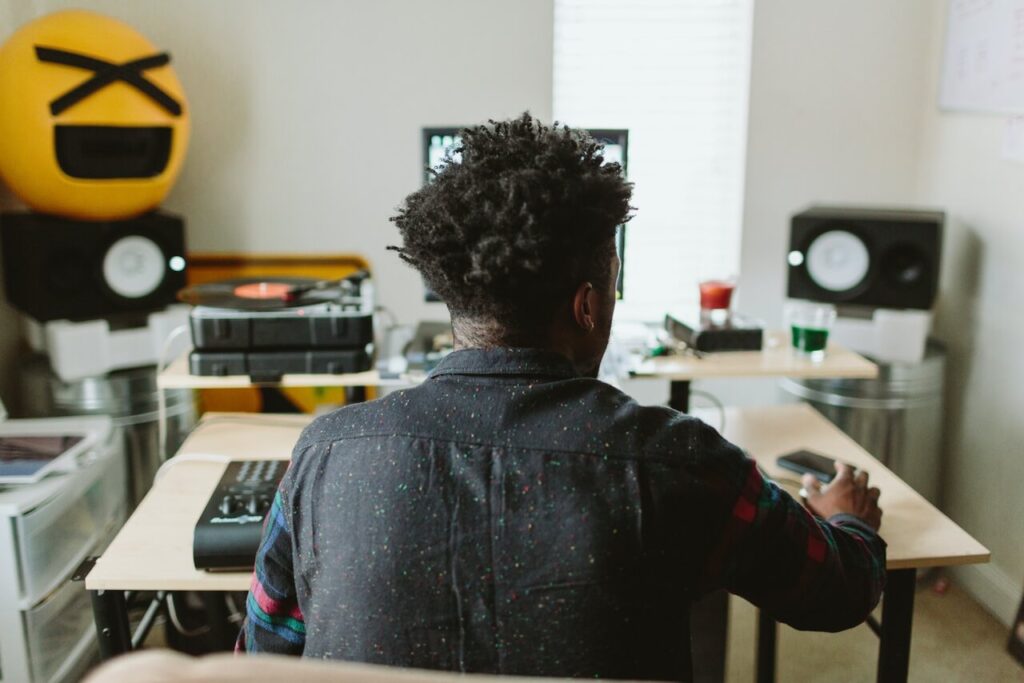 musician making music on the computer