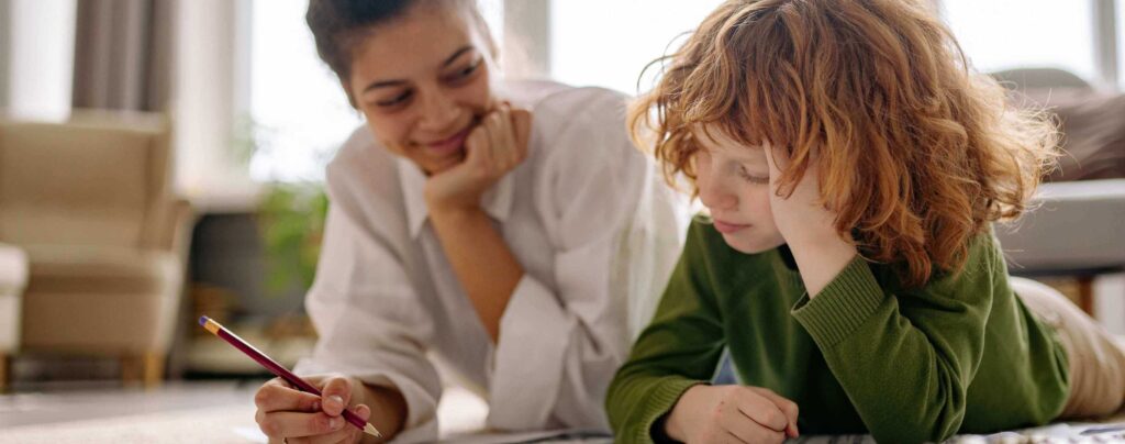 Flute teacher teaching the young student at home