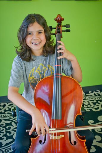 velocity student playing cello