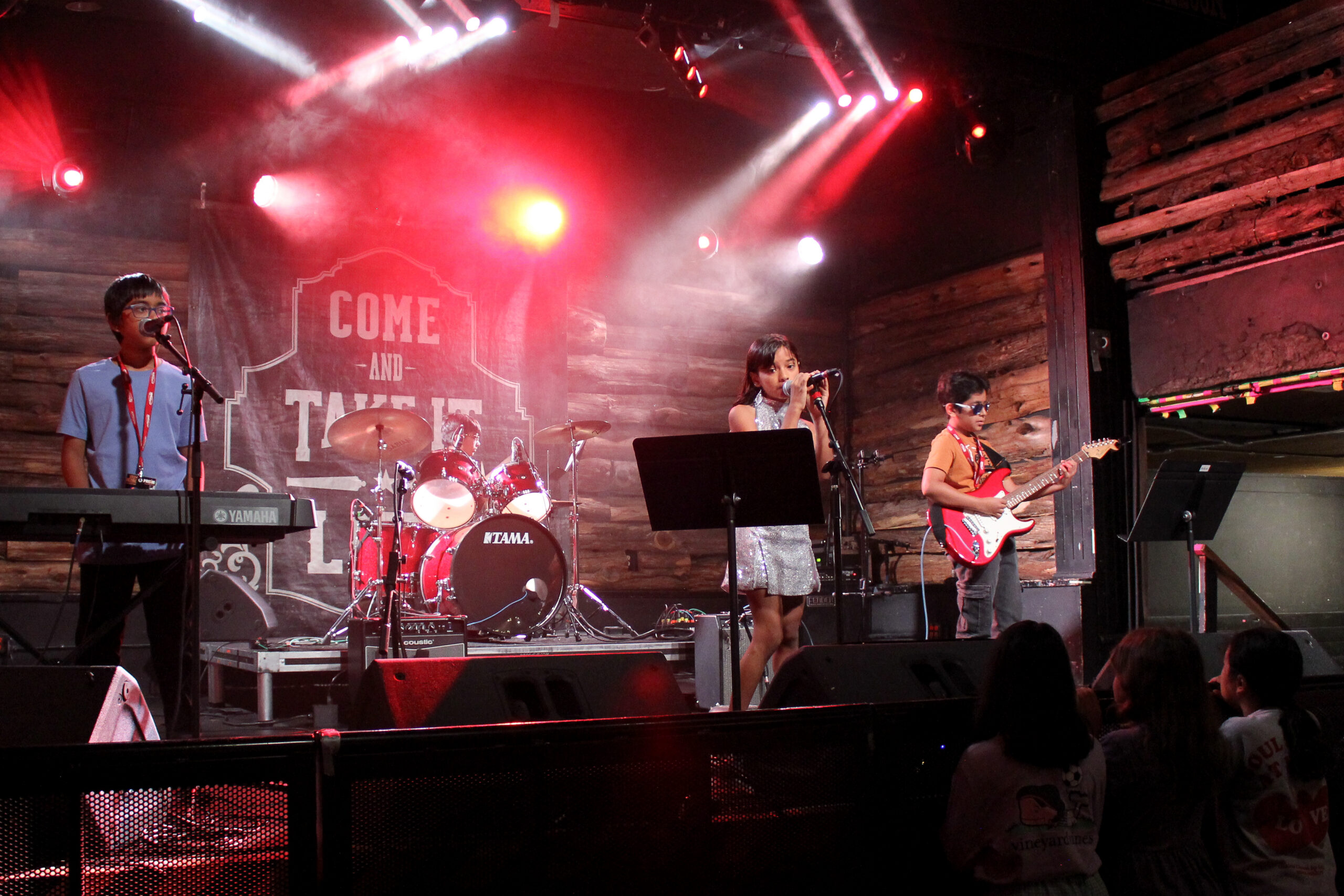 Step Onstage band performing