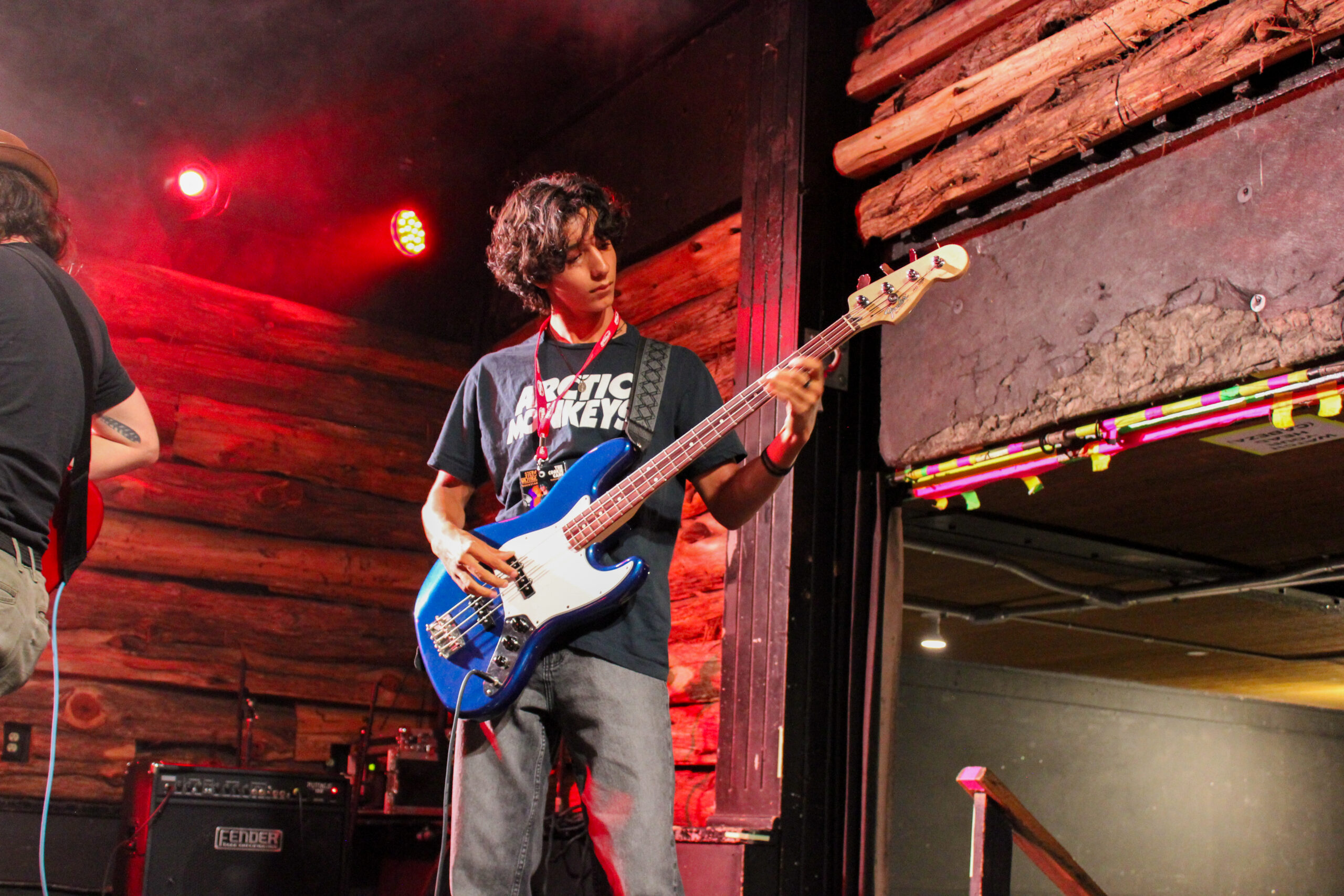 Step Onstage bassist performing