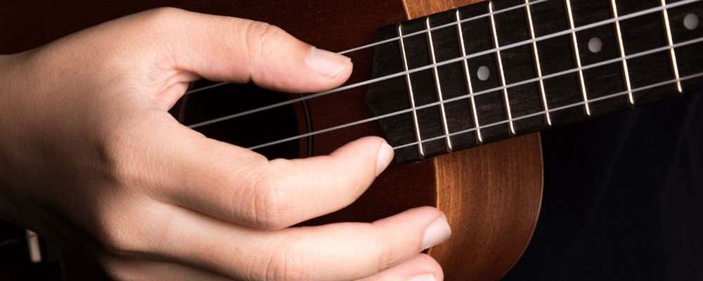 musician playing the guitar