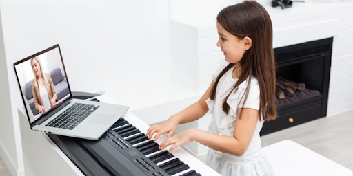 girl playing piano with online teacher