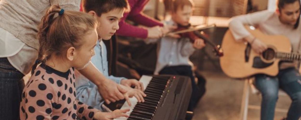 kids playing instruments at summer camp