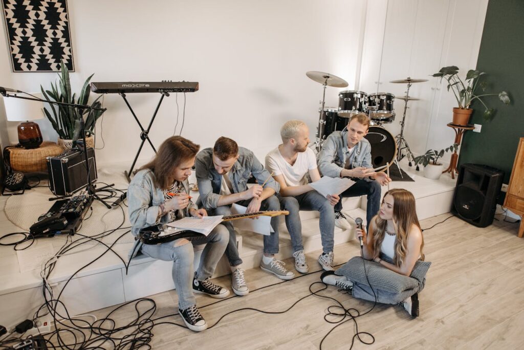 Members Of The Band Discussing