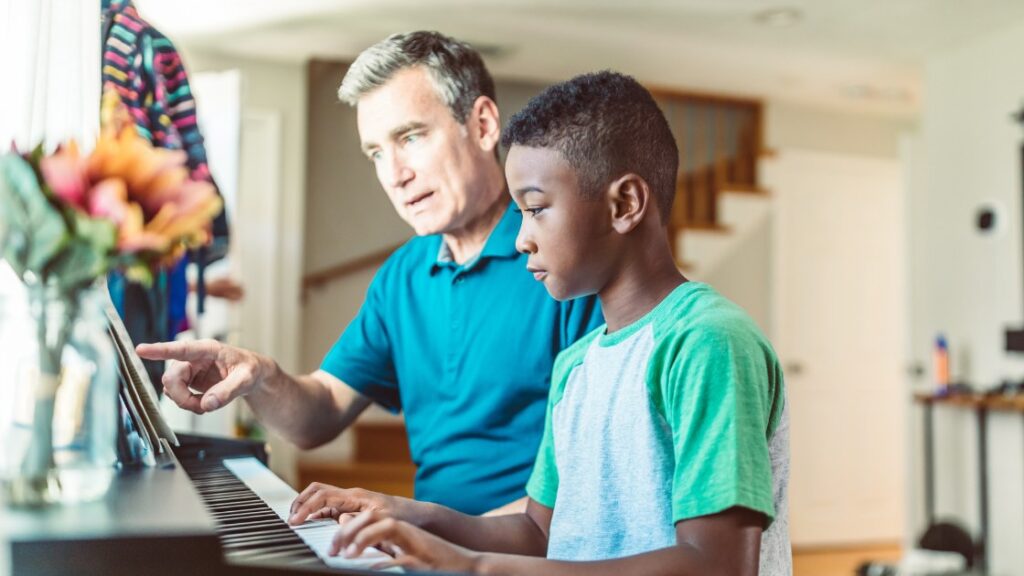 playing piano with parent
