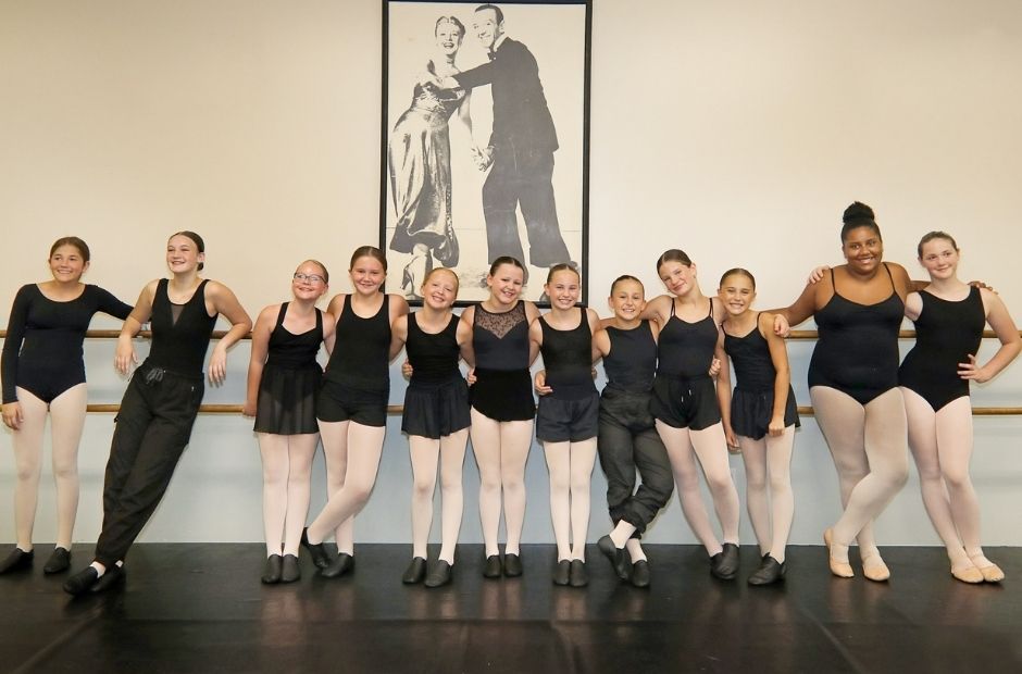 students hanging out in dance class together