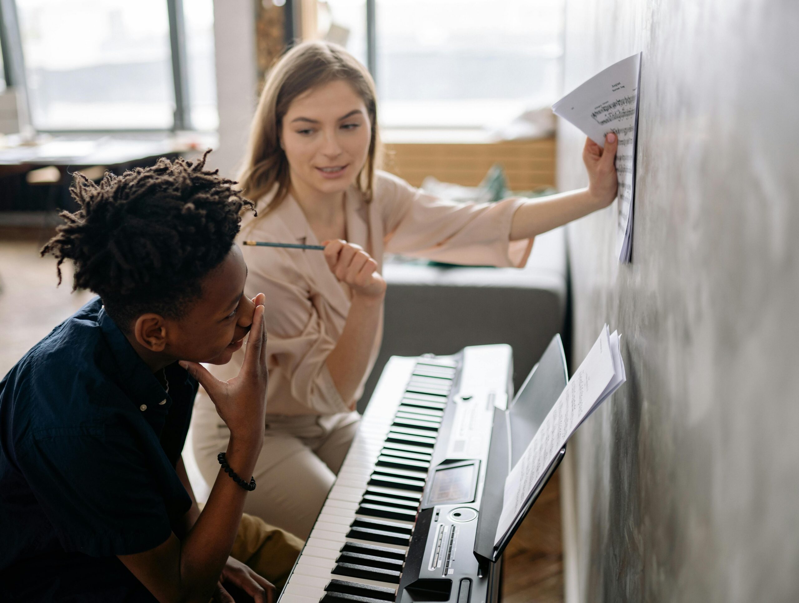Boy learning the piano