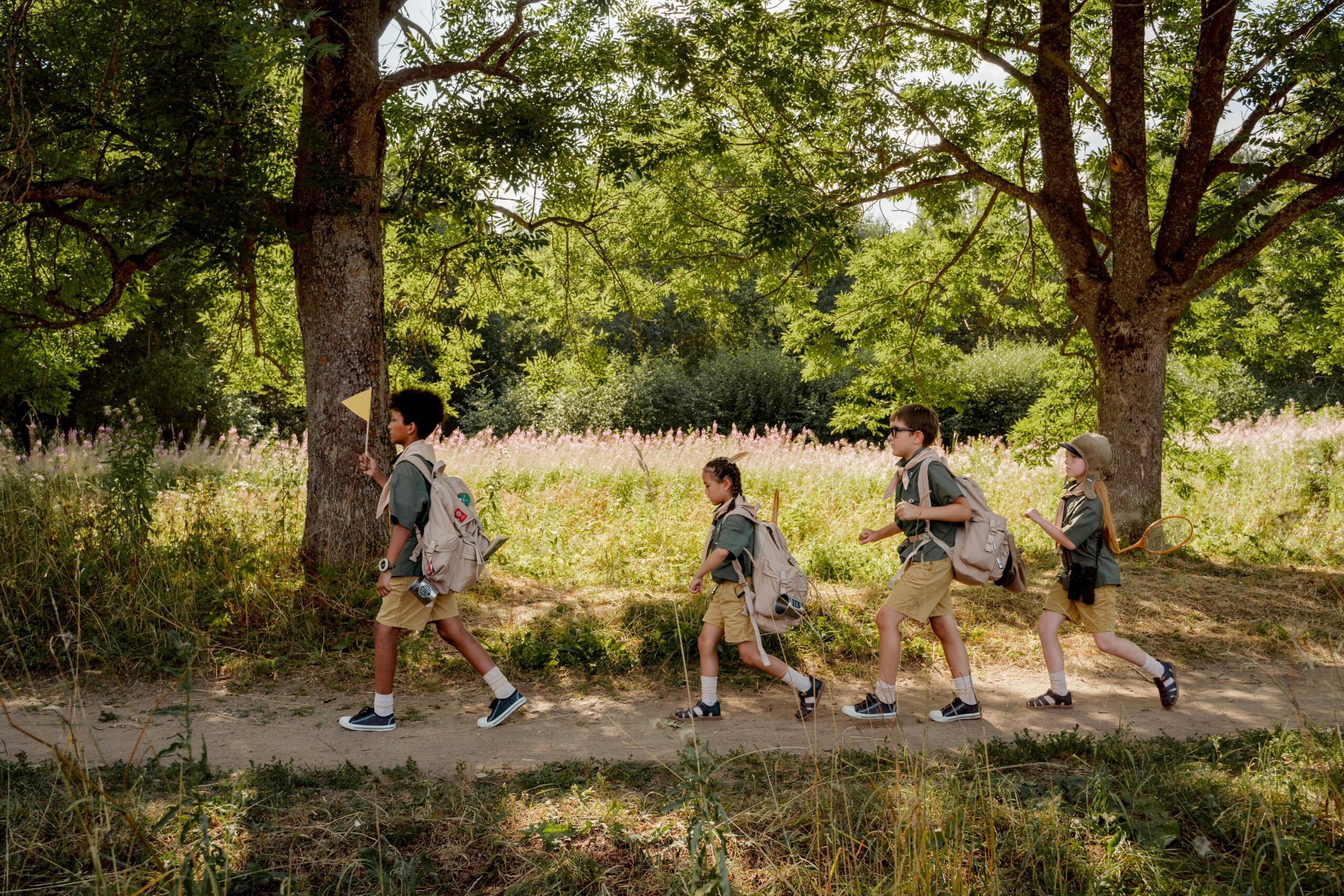 Summer camp walking in the woods